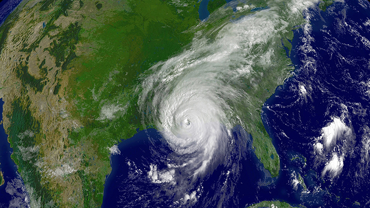 Overhead view of a hurricane hitting the United States.