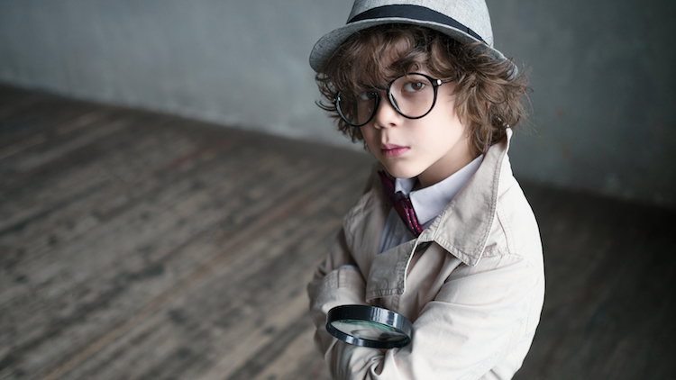 boy in detective costume.