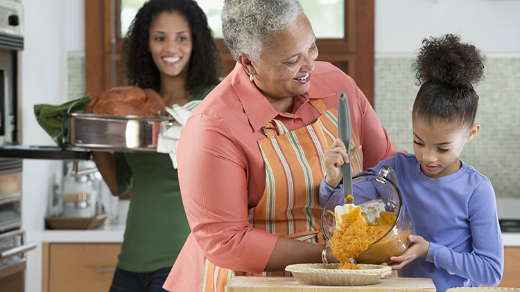 family making Thanksgiving Dinner